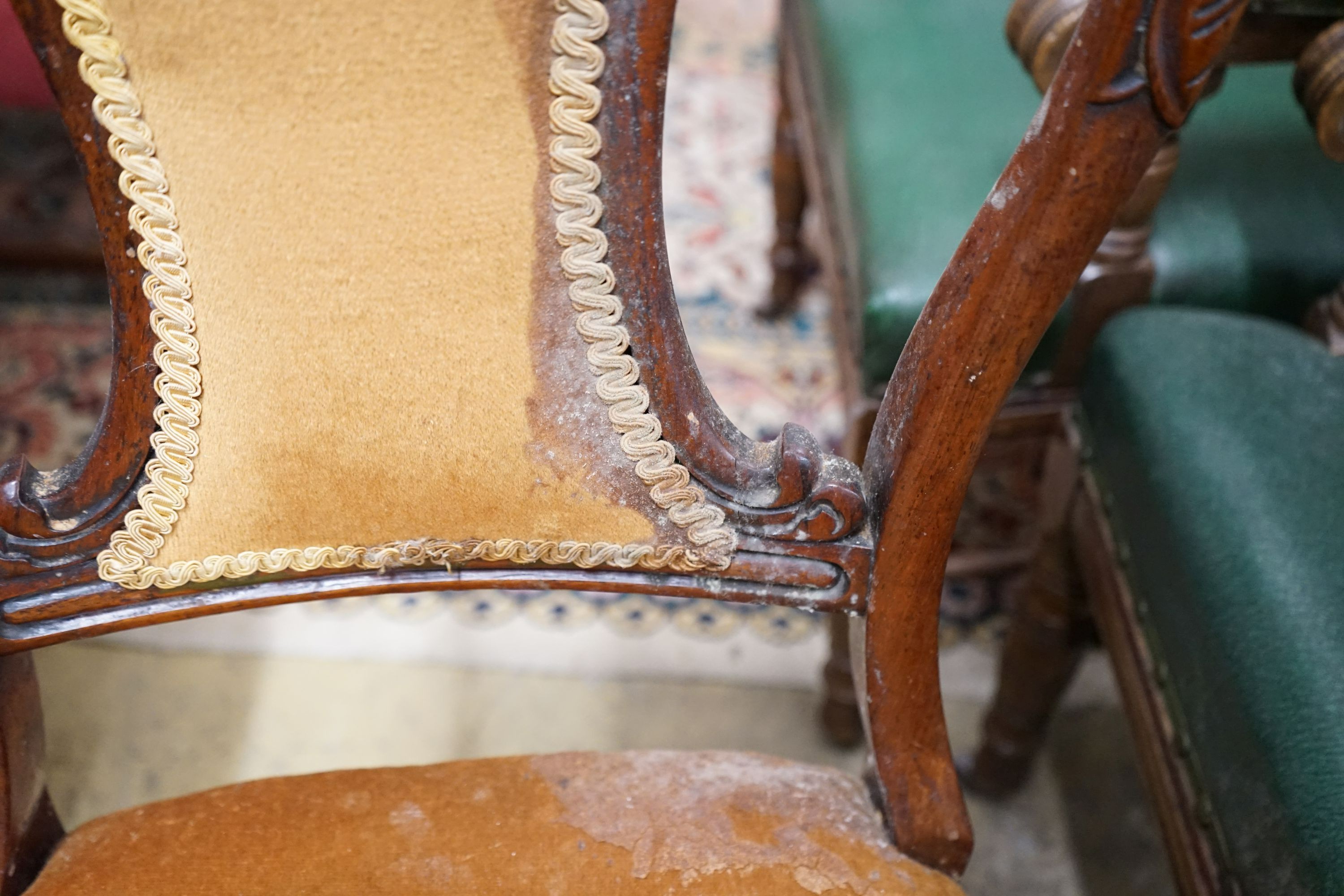 A set of five Victorian rosewood dining chairs